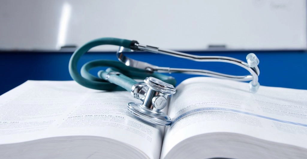 stethoscope on book - nursing ceu courses